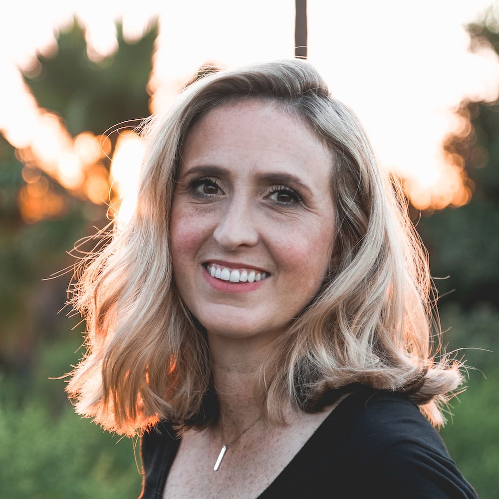 smiling woman in shallow focus photography